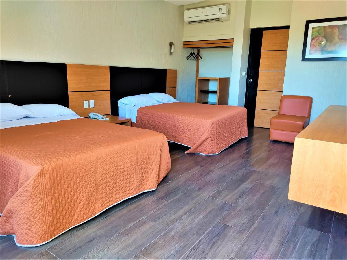 Hotel Oasis Heroica Caborca المظهر الخارجي الصورة
